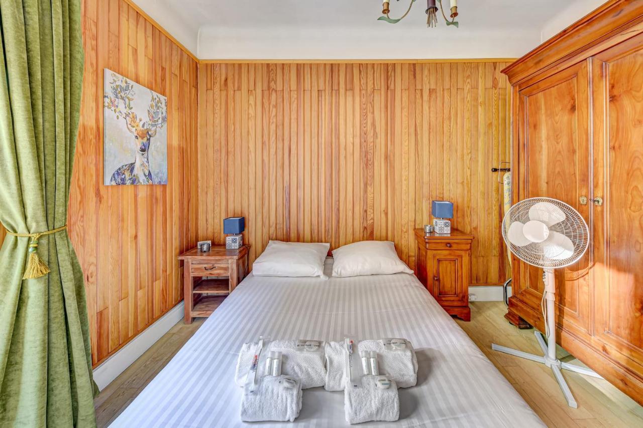 Appartement Groult - Welkeys ปารีส ภายนอก รูปภาพ